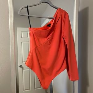 NBD Aaliyah bodysuit in red orange.